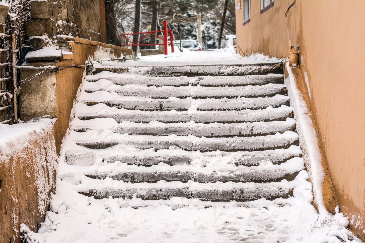 Snow covered stairs, blizzard