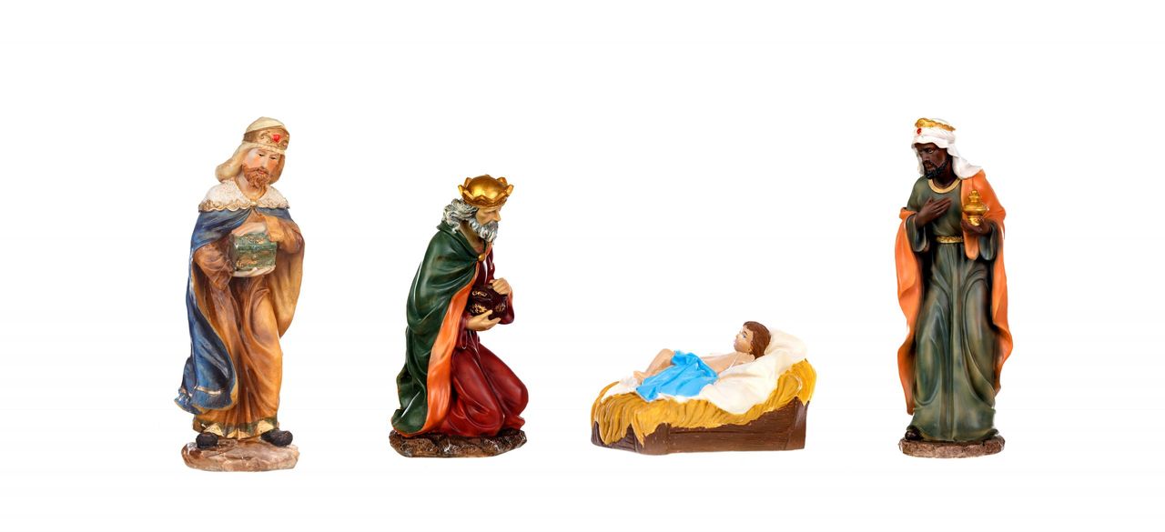 Isolated nativity scene; the three Magi and Jesus Christ
