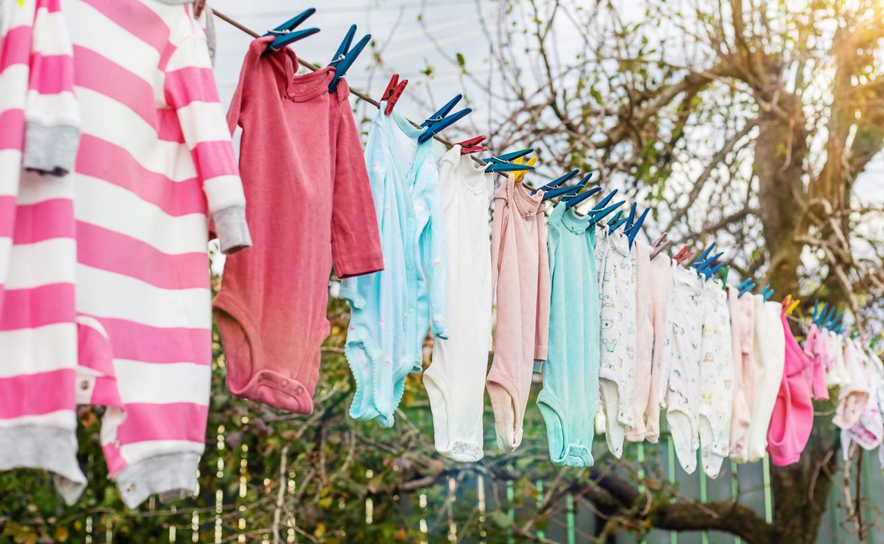 Children clothes dry outside after washing. Selective focus. baby.