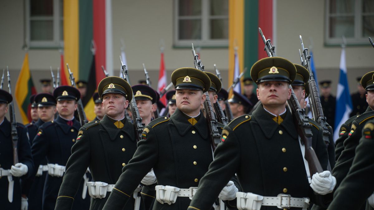 VILNIUS, LITHUANIA - 2024/03/29: Lithuanian soldiers march during the 20th anniversary of Lithuania's NATO membership celebration. Solemn ceremony to mark Lithuania's NATO membership 20th anniversary took place at the S. Daukantas Square, in front of the Presidential Palace in Vilnius, on March 29, 2024. 20 years ago Lithuania became a full-fledged member of NATO. (Photo by Yerchak Yauhen/SOPA Images/LightRocket via Getty Images)
