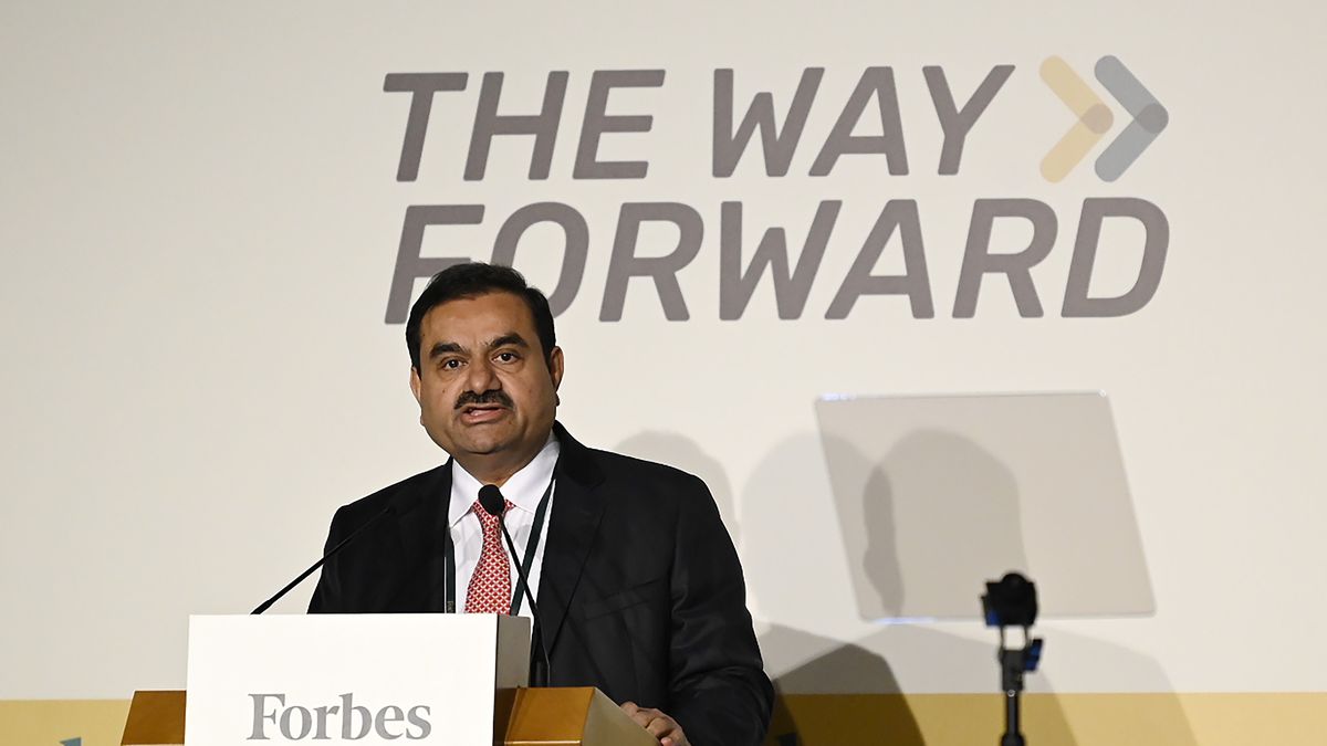 Gautam Adani, chairman of Adani Group speaks during the Forbes CEO Summit in Singapore, on Tuesday, Sept. 27, 2022. Adani said, getting rid of all fossil fuels instantly would not work for India, in his speech. Photographer: Edwin Koo/Bloomberg via Getty Images