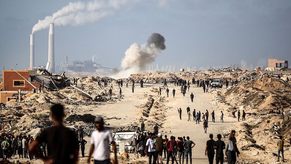 Hamas Israel Conflict
A smoke plume rises following an Israeli air strike as trucks carrying humanitarian aid enter from the Zikim border crossing along Al-Rasheed Street, west of Jabalia in the northern Gaza Strip, on June 25, 2025, amid the ongoing war between Israel and Hamas. (Photo by Majdi Fathi/NurPhoto via Getty Images)
NurPhoto
humanitarian efforts, june 25, geopolitical tension, nurphoto, civilian impact, zikim border crossing, military action, smoke plume, international relations, aid delivery, northern gaza strip, border, majdi fathi, israeli air strike, trucks, escalation., al-rasheed street, hamas, emergency response, gaza, air raid, relief operations
