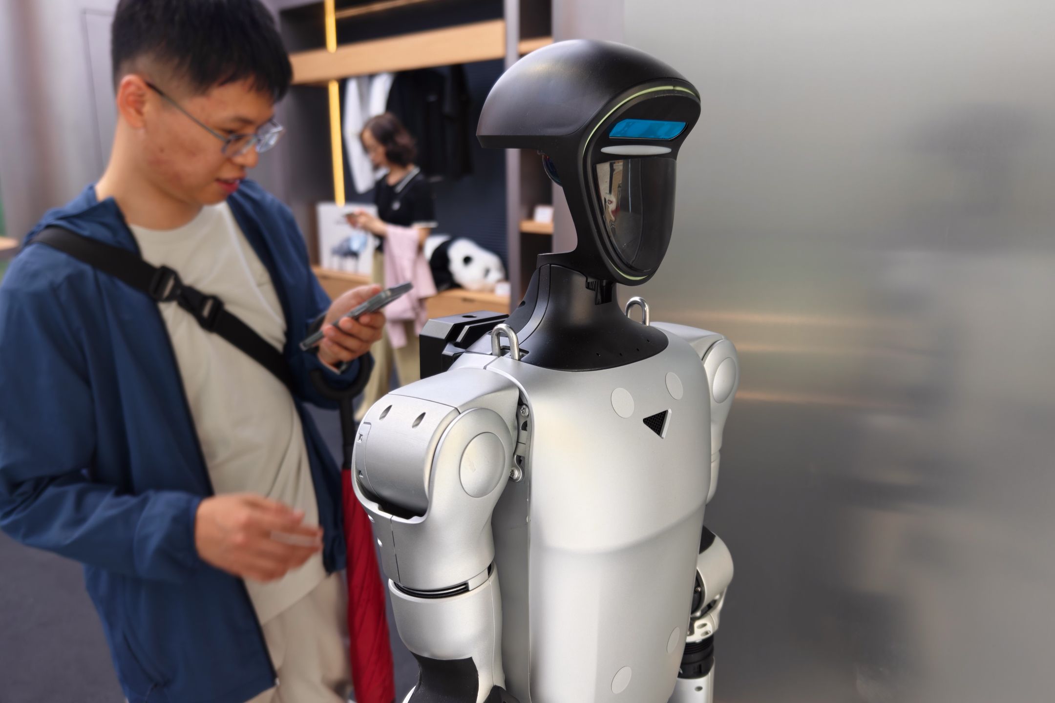 SHANGHAI, CHINA - JUNE 03 2026: A humanoid for retail at a Unitree shop in a department store in Shanghai, China, Wednesday, June 3, 2026. The robotics technology company will go on IPO in China soon. (Photo credit should read WANG GANG/ Feature China/Future Publishing via Getty Images)