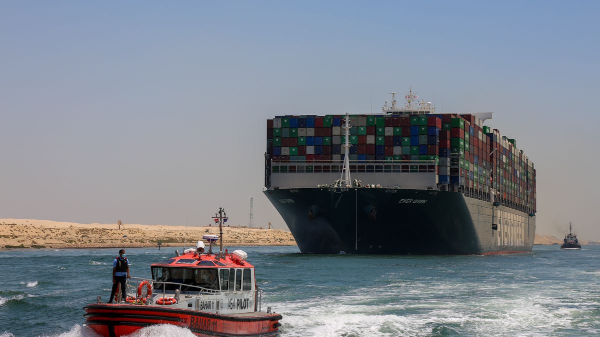 Evergreen ship leaves the Suez Canal for the Mediterranean after signing the settlement contract, on July 7, 2021 in Ismailia, Egypt. The ship had settled in the channel in March, which required a six-day salvage operation to free the ship. The Canal Authority and the Egyptian government detained the ship for more than 3 months to settle the damage caused to the ship (Photo by Ziad Ahmed/NurPhoto via Getty Images)