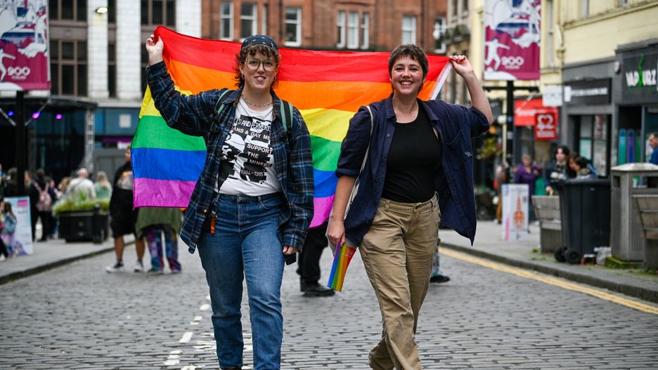 STIRLING, SCOTLAND - SEPTEMBER 21: Alusha Romaniszyn (L) and Betty Andrews (R) take to the streets at Stirling Pride on September 21, 2024 in Stirling, Scotland. This is the first Pride Event to take place in Stirling and the Forth Valley. It comes after nearly 300 Forth Valley residents filled out a survey from Creative Stirling, LGBT Youth Scotland, and the University of Stirling which sought to gauge levels of support for a Pride event in the Forth Valley. (Photo by Ben Montgomery/Getty Images)