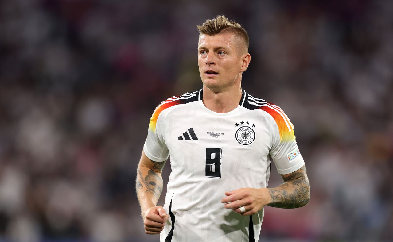 Why does the Germany national team play in white kits?