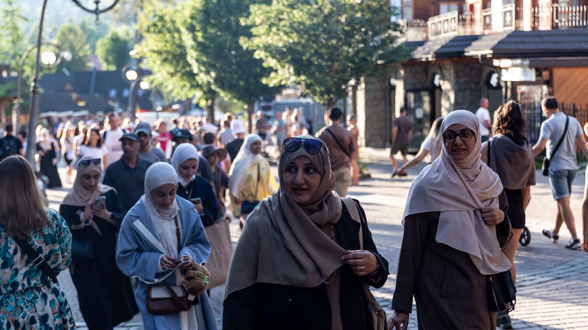 Crowds Of Tourism Visit Zakopane In Poland
A Muslim family walks on landmark Krupowki Street in Zakopane, Poland, as the Arab Peninsula Muslim tourists come in numbers to Poland and choose Zakopane as its favorite destination - August 8, 2025. Zakopane is a gate-town to Tatra National Park, the 2024 world's most visited National Park. (Photo by Dominika Zarzycka/NurPhoto via Getty Images)
NurPhoto
krupowki, editorial, krupowki street, tourist destination, lifestyle, arab peninsula, holiday, muslim family, muslim tourists, destination, world's most visited, daily life, podhale, colour image, landmark, muslim, heatwave