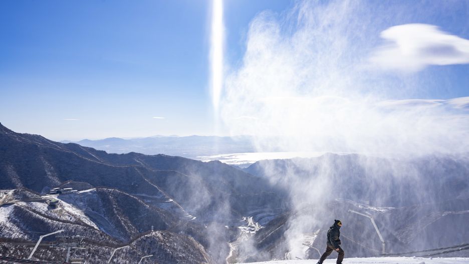 BEIJING, CHINA - NOVEMBER 15: Snowmaking machines work at the National Alpine Skiing Center, venue for alpine skiing events of Beijing 2022 Winter Olympics, in Yanqing District on November 15, 2021 in Beijing, China. (Photo by VCG/VCG via Getty Images)