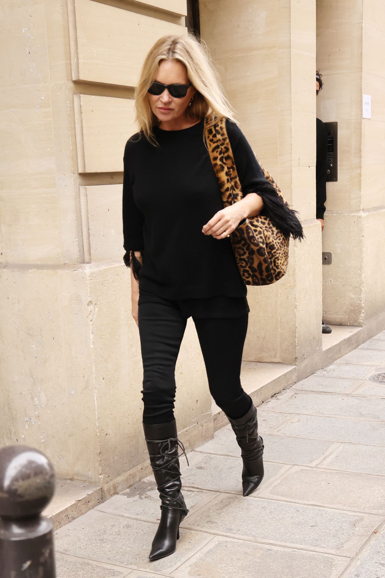 Kate Moss with a leopard print bag