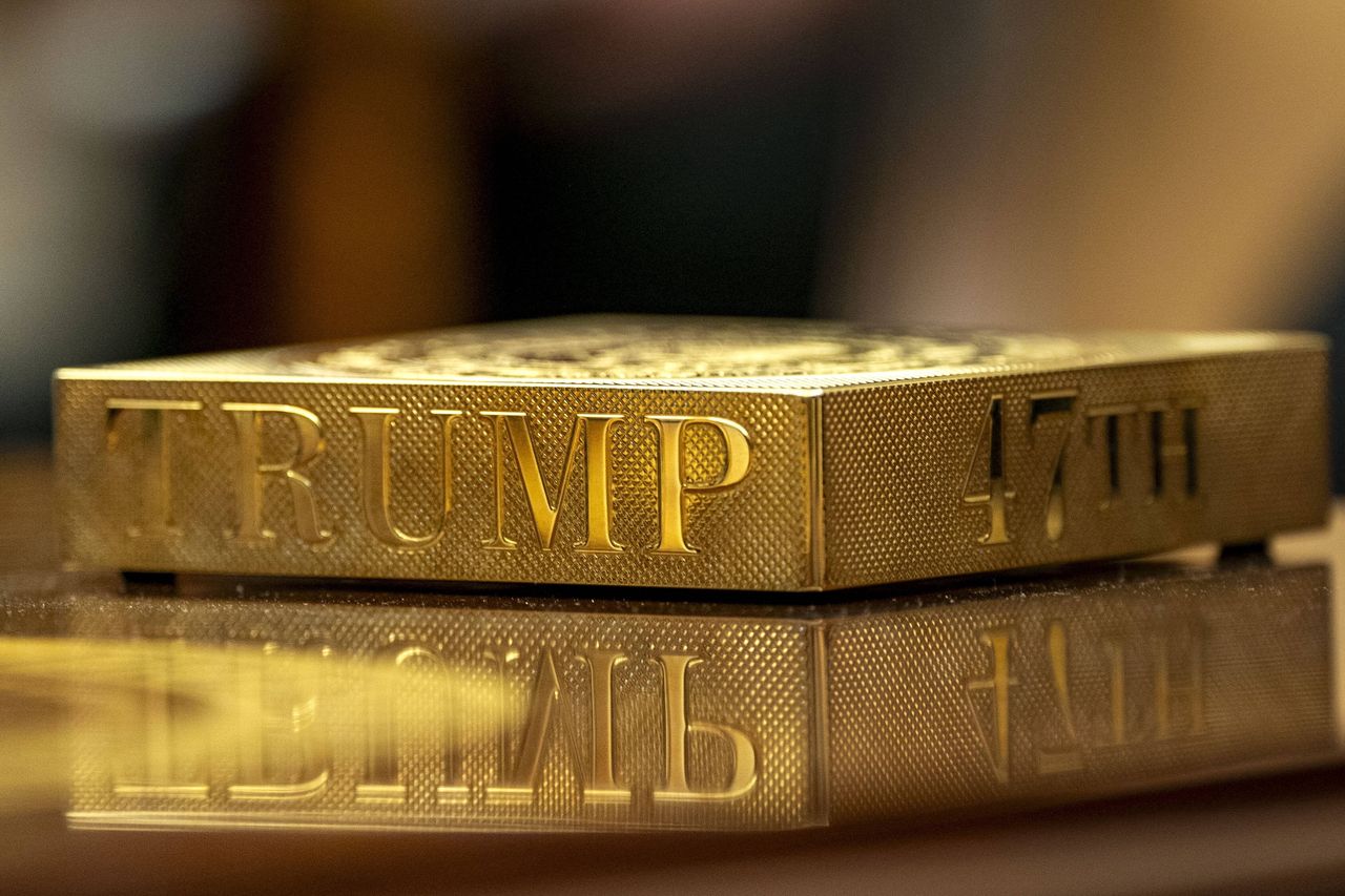 A golden paperweight in the Oval Office