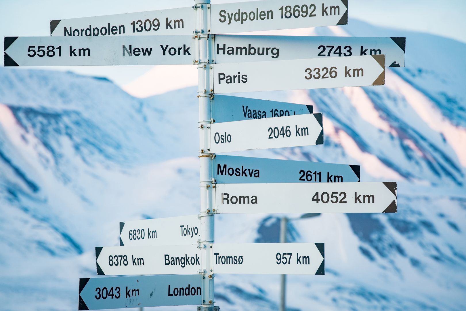 sign, norway, north, guidance, concept, explore, direction, destination, adventure, arctic, arrow, background, blue, choice, city, crossroad, directional, distance, earth, europe, european, geography, global, globe, information, international, journey, longyearbyen, mountain, northern, planet, pole, post, road, showing, signpost, sky, slope, snow, spitsbergen, spring, states, svalbard, symbol, tourism, travel, way, white, winter, world