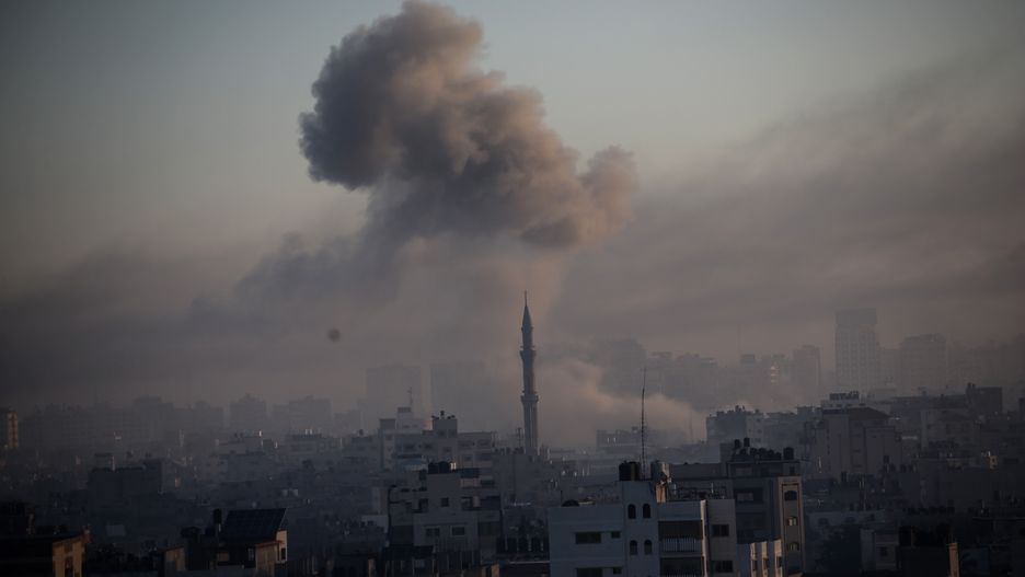 GAZA CITY, GAZA - OCTOBER 13:  Smoke rises from Israeli raids on October 13, 2023 in Gaza City, Gaza. At least 1,200 people, including at least 326 children, have been killed and more than 300,000 displaced, after Israel launched sustained retaliatory air strikes after a large-scale attack by Hamas. On October 7, the Palestinian militant group Hamas launched a surprise attack on Israel from Gaza by land, sea, and air, killing 1000 people and wounding more than 2000. Israeli soldiers and civilians have also been taken hostage by Hamas and moved into Gaza. The attack prompted a declaration of war by Israeli Prime Minister Benjamin Netanyahu. (Photo by Ahmad Hasaballah/Getty Images)