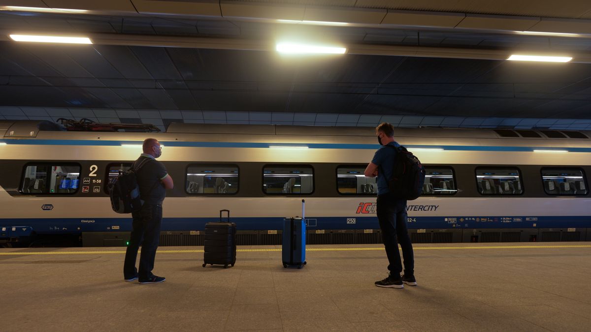 Passangers wait to get on the train at Krakow central train station.Polish national railway operator PKP Intercity has restored the high-speed traffic. The first Pendolino trains returned to the tracks today after a two-month suspension. However, only the Krakow  Warsaw  Gdynia route is served at the moment.On Friday, May 22, 2020, Krakow, Lesser Poland Voivodeship, Poland (Photo by Artur Widak/NurPhoto via Getty Images)