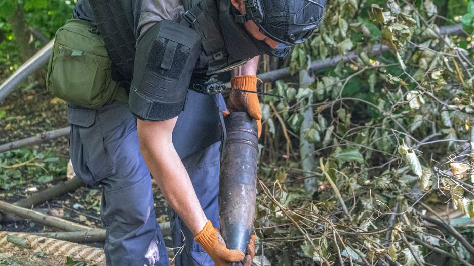 Vladislav Kulish
war, unexploded ordnance, mortar shell, ammunition, uxo, explosive, danger, weapon, soldier, deminer, military, conflict, disposal, security, protective gear, hazardous, close-up, rust, ordnance, ukraine, battlefield
