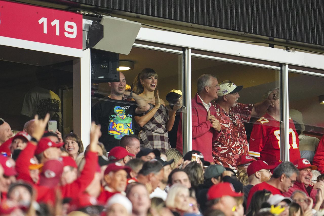 KANSAS CITY, MO - OCTOBER 07:  Taylor Swift looks on from the stands during an NFL football game between the New Orleans Saints and the Kansas City Chiefs at GEHA Field at Arrowhead Stadium on October 7, 2024 in Kansas City, Missouri. (Photo by Cooper Neill/Getty Images)