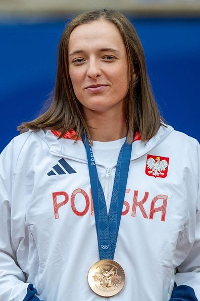 Tennis - Olympic Games Paris 2024: Day 8
Iga Swiatek of Team Team Poland  pose on the podium during the Tennis Women's Singles medal ceremony after the Tennis Women's Singles Gold medal match on day eight of the Olympic Games Paris 2024 at Roland Garros on August 03, 2024 in Paris, France. (Photo by Andrzej Iwanczuk/NurPhoto via Getty Images)
NurPhoto
champion, gold medal match, paris, nurphoto, tournament, tennis court, andrzej iwanczuk, podium, august 03, winner, olympic champion, victory, paris 2024, day eight, women's singles, olympic games, roland garros, professional tennis, sports photography., paris2024, team poland, international, iga swiatek