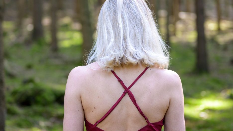Woman wearing backless magenta dress in forestRear view of woman with medium-length blond hair wearing backless magenta dress in forestmheim3011attractive, blond, caucasian, elegant, female, glamorous, gown, lady, lifestyle, medium-length, mid, one, person, seductive, sensual, sexy, tranquil, waistup, weekend, woman, woods