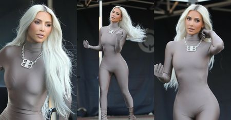 Kim Kardashian przechadza się po planie reklamy w dopasowanym kostiumie, eksponując zgrabną sylwetkę (ZDJĘCIA)