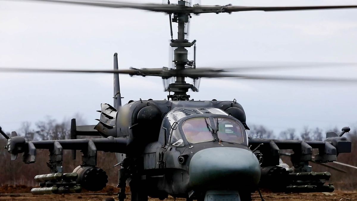 UKRAINE - APRIL 23, 2022: Kamov Ka-52 helicopters of the Russian Aerospace Forces have carried out missile strikes at undisclosed armored military hardware and camouflaged positions of the Armed Forces of Ukraine, destroying a tank, an infantry fighting vehicle, and a strong point. Video screen grab. Best quality available. Russian Defence Ministry/TASS