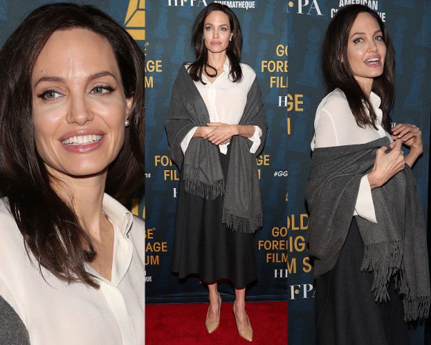 Szczęśliwa Angelina w eleganckiej stylizacji