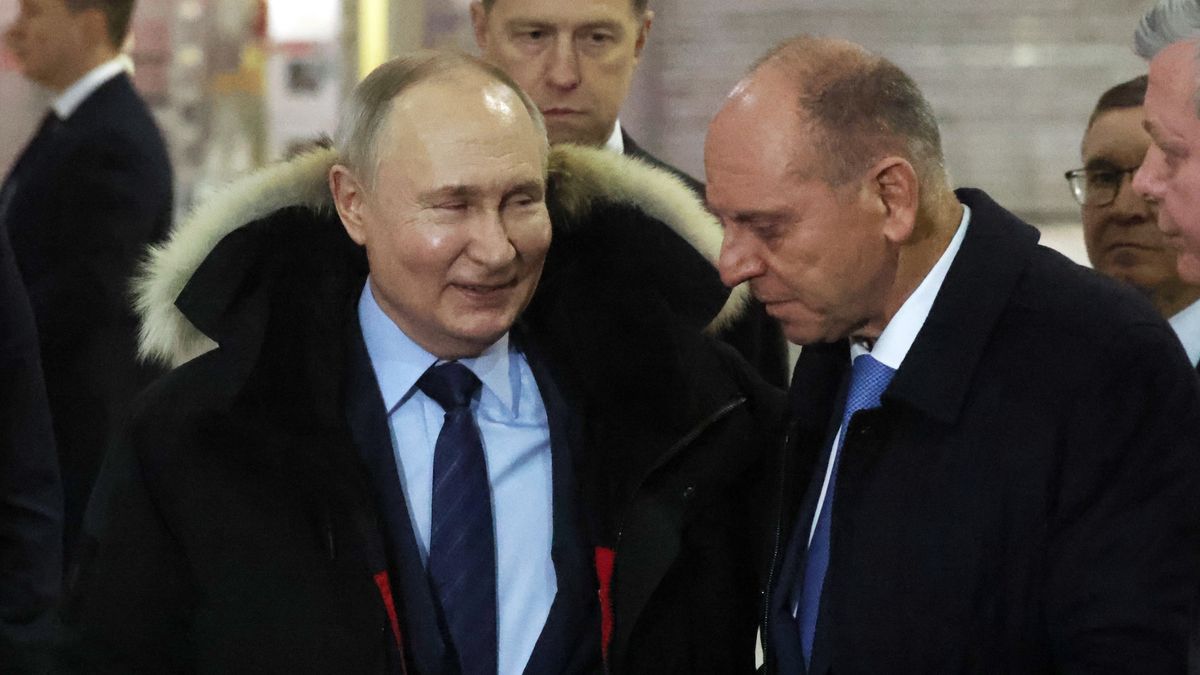 VERKHNYAYA PYSHMA, RUSSIA - FEBRUARY 15:  (RUSSIA OUT) Russian President Vladimir Putin (L) smiles as billionaire and businessman Dmitry Pumyansky (R) looks on while visiting the Ural Locomotive plant, on February 15, 2024 in Verkhnyaya Pyshma near Yekatirinburg, Russia. Vladimir Putin is having a two-day trip to the regions of Yekaterinburg and Chelyabinsk prior to the 2024 Presidential Election, planned on March. (Photo by Contributor/Getty Images)