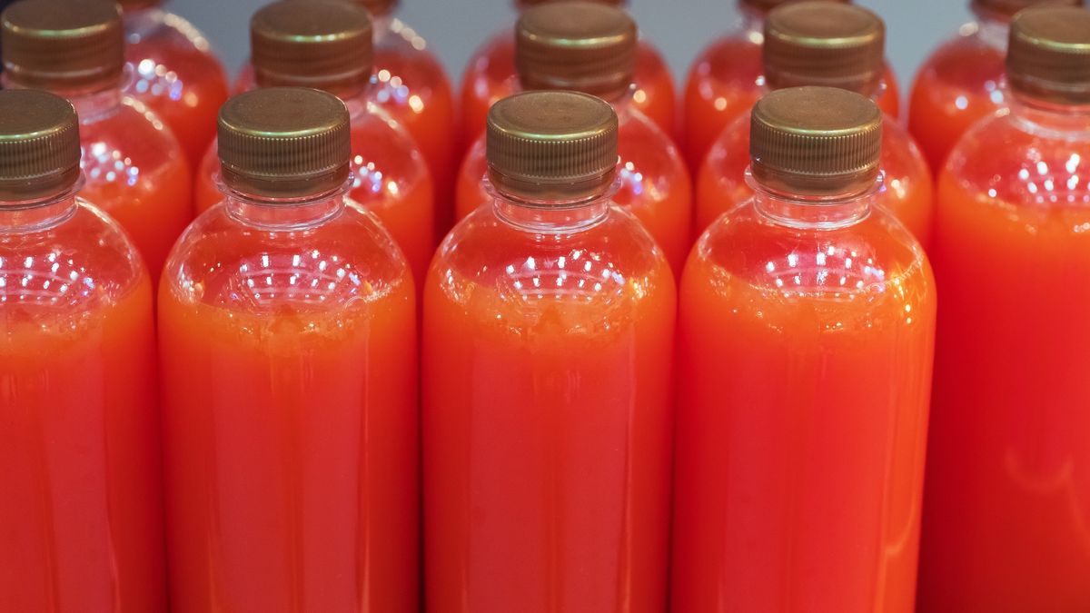 Close up Bottled citrus fruit juice with drinking, thai street food marketClose up Bottled citrus fruit juice with drinking, thai street food marketamynapaloha