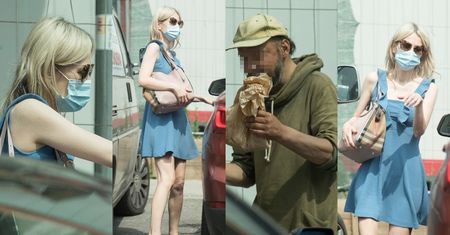 Filantropka Magdalena Ogórek ratuje bezdomnego przed głodem z torebką za ponad 4 tysiące pod pachą (ZDJĘCIA)