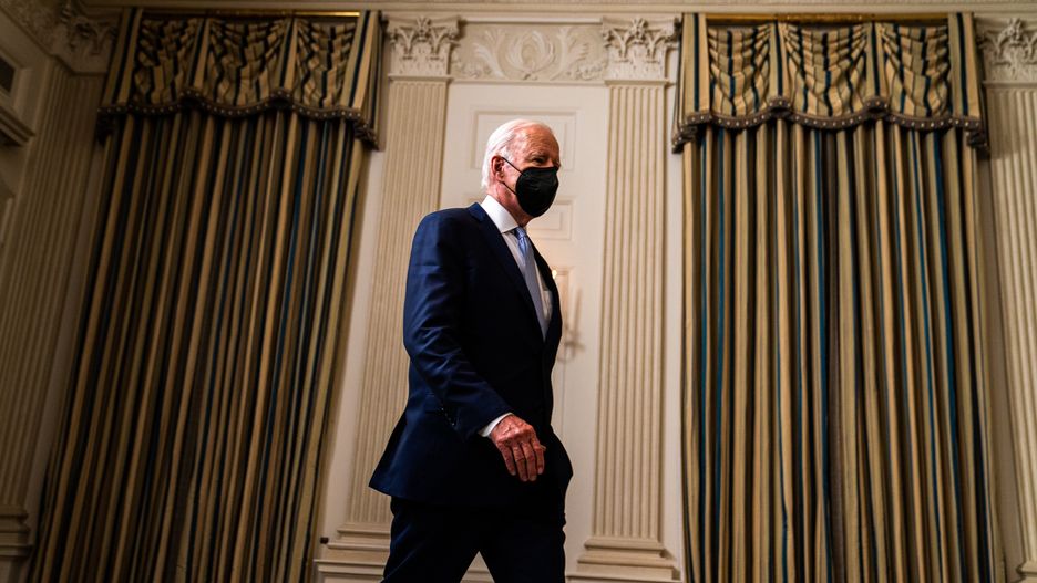 WASHINGTON, DC  July 28, 2022:

US President Joe Biden enters the room to deliver remarks on the Inflation Reduction Act of 2022 on Thursday in the State Dining Room of the White House on July 28, 2022.

(Photo by Demetrius Freeman/The Washington Post via Getty Images)