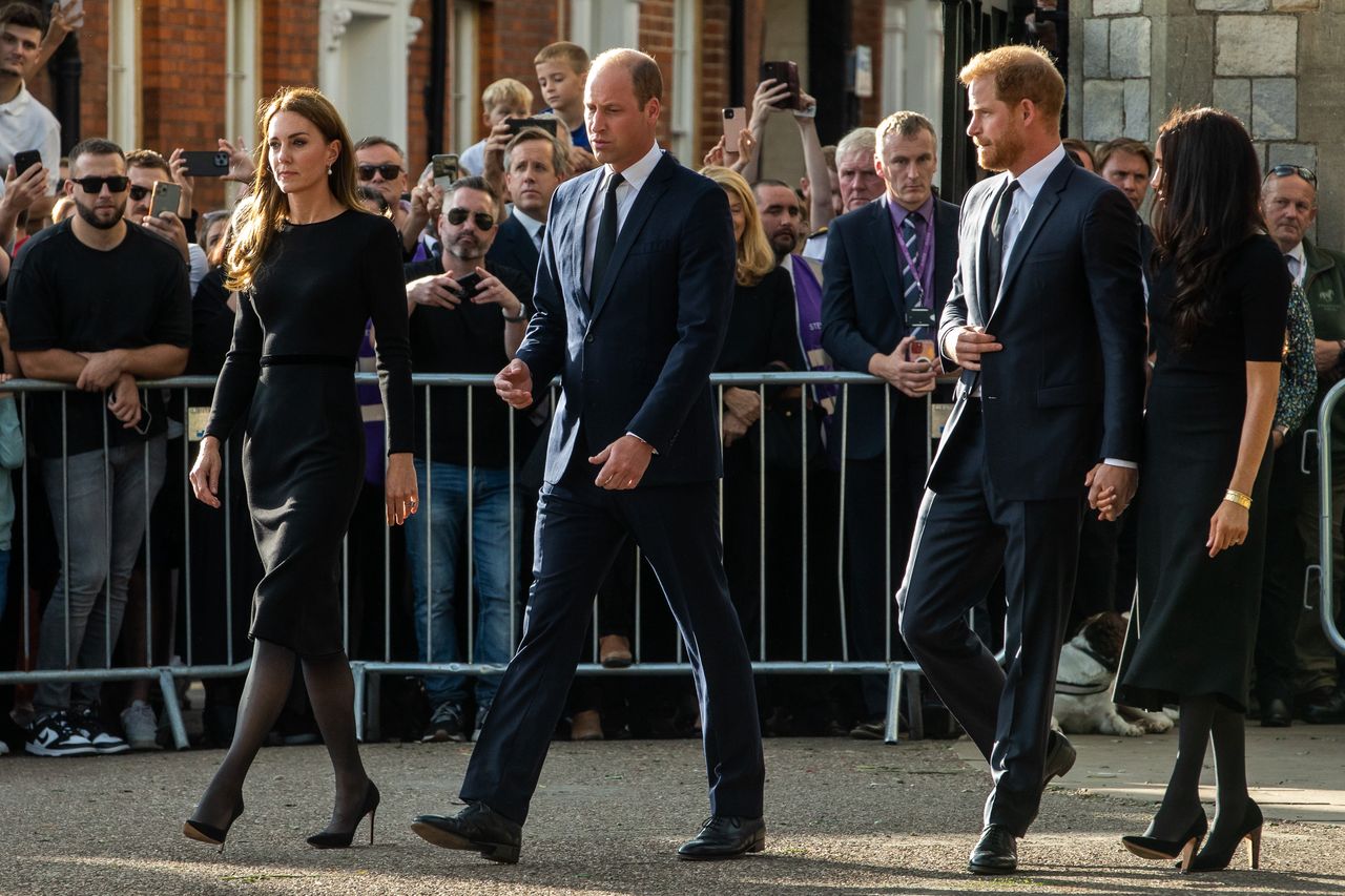 Prince William and Catherine, the new Prince and Princess of Wales, accompanied by Prince Harry and Meghan, the Duke and Duchess of Sussex, proceed to greet well-wishers outside Windsor Castle on 10th September 2022 in Windsor, United Kingdom. Queen Elizabeth II, the UK's longest-serving monarch, died at Balmoral aged 96 on 8th September 2022 after a reign lasting 70 years. (photo by Mark Kerrison/In Pictures via Getty Images)