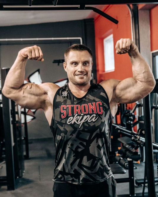 Krzysztof Radzikowski z partnerką