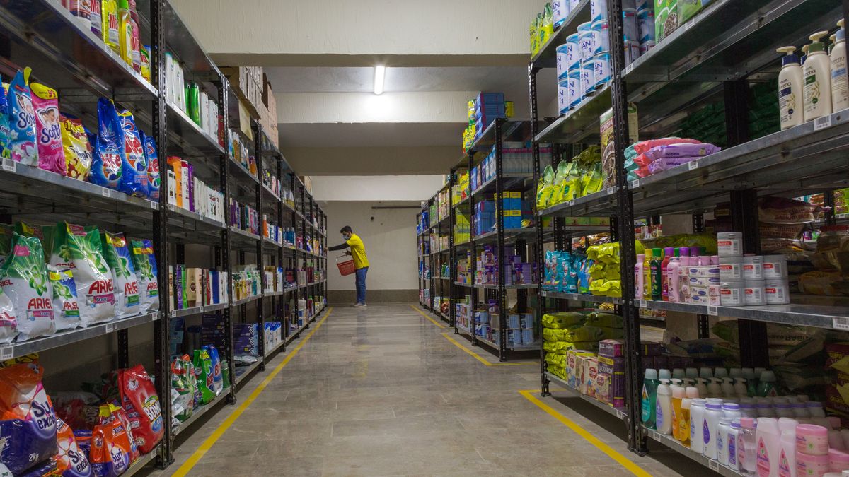 A Krave Mart worker collects items at one of the company's dark stores in Karachi, Pakistan, on Saturday, Dec. 11, 2021. Pakistan's rapid delivery startup Krave Mart has raised the country's largest early funding to grow its business in the worlds fifth-most populous nation. Photographer: Asim Hafeez/Bloomberg via Getty Images