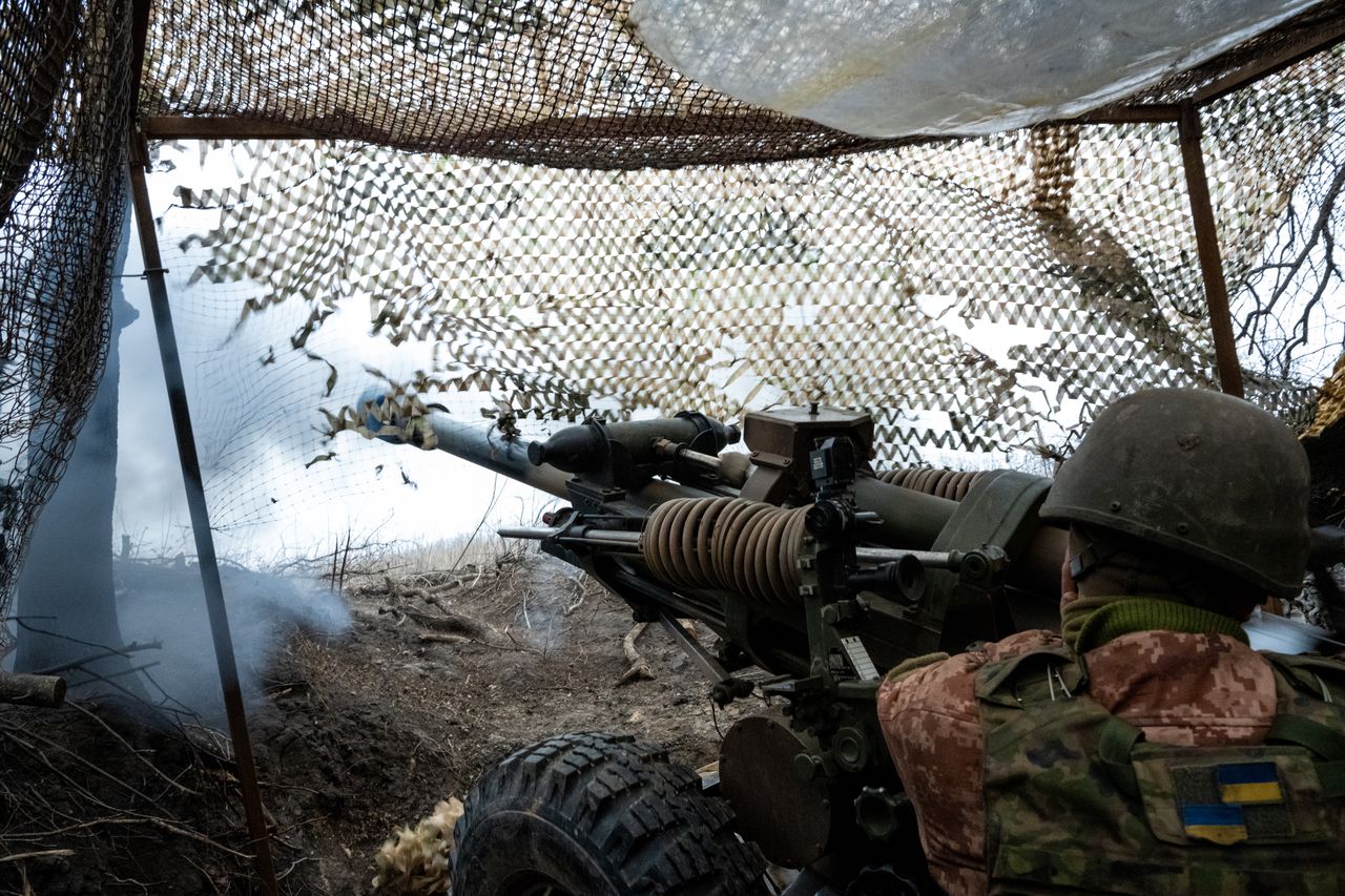 UNSPECIFIED, UKRAINE - FEBRUARY 18: Ukrainian gunner Vasyl Zozulia fires the gun, as soldiers of the Ukraine Armys 95th Brigade fire 105mm artillery shells from a British-made L119 howitzer at Russian positions in the Lyman direction on February 18, 2024 in an undisclosed location, Ukraine. Ukrainian units across the 600-mile frontline are facing severe shortages of weapons, artillery shells and other ammunition - supplies of which are dependent on critical but shrinking American and European aid. As the two-year anniversary of Russias all-out invasion of Ukraine nears on February 24, Russian forces have stepped up attacks all along the front, causing Ukrainian units like this in the eastern Donbas region to dig deeper into defensive positions. (Photo by Scott Peterson/Getty Images)