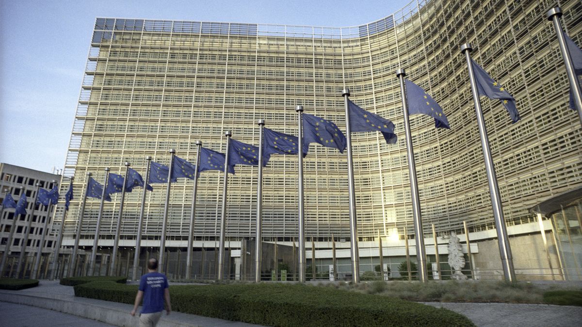 BRUSSELS, BELGIUM - MAY 24: EU flags are seen in front of the Berlaymont, the EU Commission headquarter on May 24, 2026 in Brussels, Belgium. The Berlaymont building serves as the headquarters of the European Commission, housing the offices of the Commission President, various Directorates-General, and extensive meeting facilities where EU policies are developed and coordinated. Beyond its administrative function, its iconic cross-shaped design and public esplanade make it a symbolic landmark and a key meeting point for staff, visitors, and exhibitions showcasing the European Union's work. (Photo by Thierry Monasse/Getty Images)