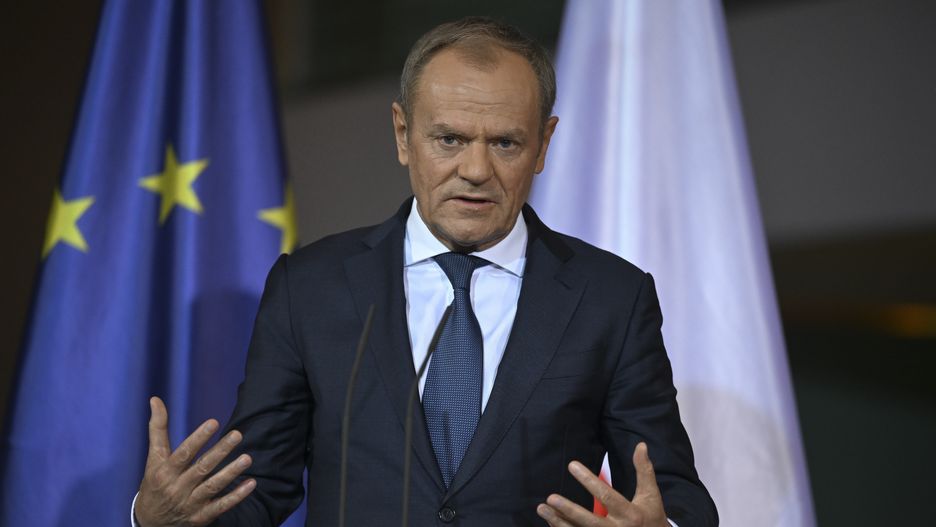 BERLIN, GERMANY - FEBRUARY 12: German Chancellor Olaf Scholz (not seen) and Polish Prime Minister Donald Tusk hold a joint press conference following their meeting in Berlin, Germany on February 12, 2024. (Photo by Halil Sagirkaya/Anadolu via Getty Images)