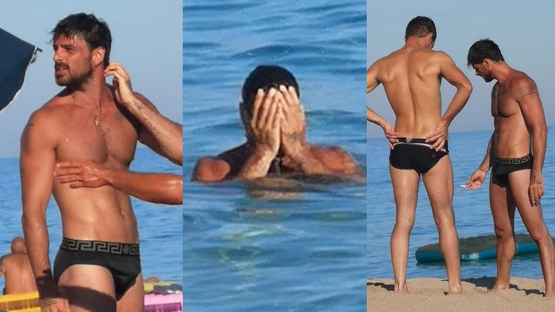 Rozebrany Michele Morrone na plaży w Apulii