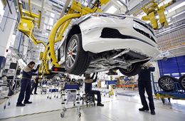 Maserati Luxury Manufacturing As Boom Signals Fiat SpA Saying Ciao To Its Italian Past
Employees work on a Maserati Ghibli luxury automobile, produced by Maserati SpA, as it travels along the production line at Fiat SpA's Grugliasco factory in Turin, Italy, on Thursday, Jan. 23, 2014. With Fiat now the full owner of U.S.-based Chrysler Group LLC, Sergio Marchionne, the chief executive officer of both companies, is shifting away from the European mass market and, in the process, reshaping Italian industry. Photographer: Alessia Pierdomenico/Bloomberg via Getty Images
Bloomberg
EMEA; EUROPE, EAME; EUROPE; ITALY; ITALIAN, FINANCE; FINANCIAL; ECONOMY, BUSINESS; CORPORATION; CORPORAT, ECONOMY; ECONOMIC; ECO, AUTO INDUSTRY; AUTOMAKER; CARMA, SEDAN; CAR; VEHICLE, LUXURY; EXPENSIVE; WEALTH, JOB; JOBS; EMPLOYMENT