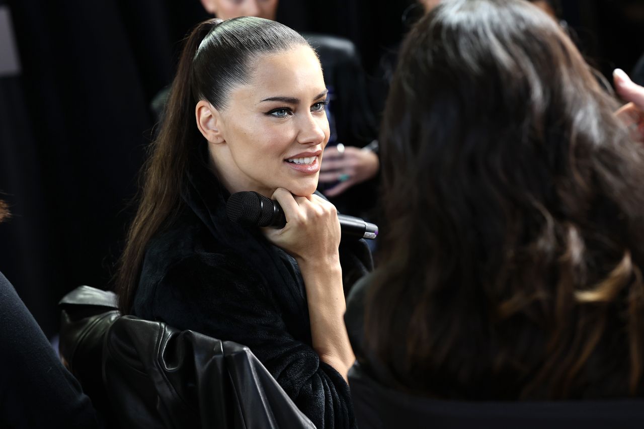 NEW YORK, NEW YORK - OCTOBER 15: Adriana Lima prepares backstage at the Victoria's Secret Fashion Show 2024 on October 15, 2024 in New York City. (Photo by Arturo Holmes/Getty Images for Victoria's Secret)