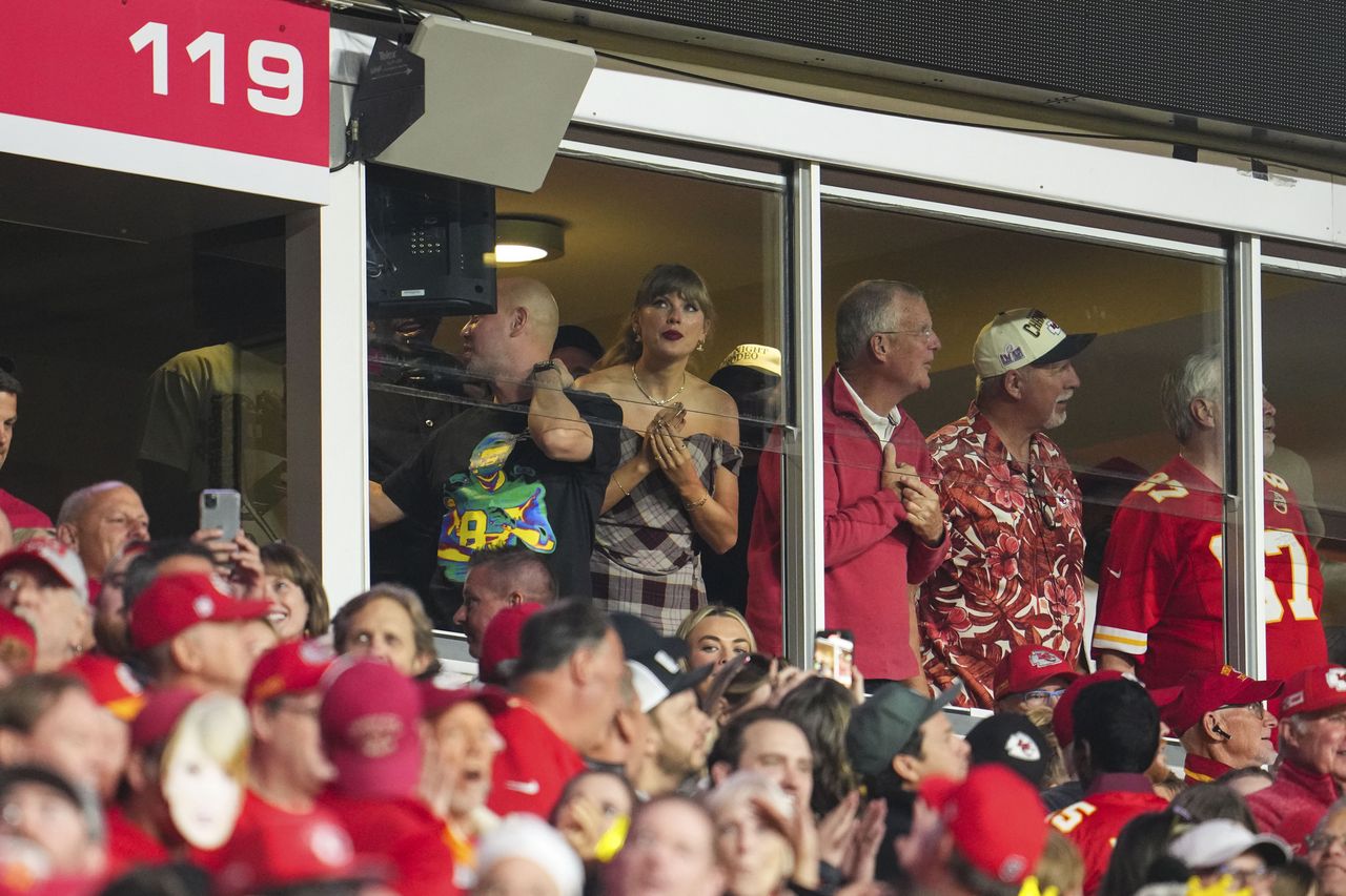 KANSAS CITY, MO - OCTOBER 07:  Taylor Swift looks on from the stands during an NFL football game between the New Orleans Saints and the Kansas City Chiefs at GEHA Field at Arrowhead Stadium on October 7, 2024 in Kansas City, Missouri. (Photo by Cooper Neill/Getty Images)