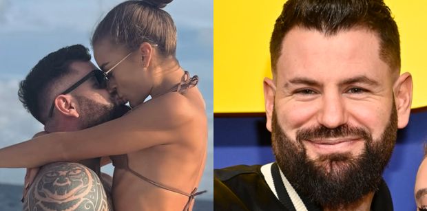 Wojciech Gola pochwalił się całuśną fotką z odzianą w kuse bikini młodszą ukochaną na rękach