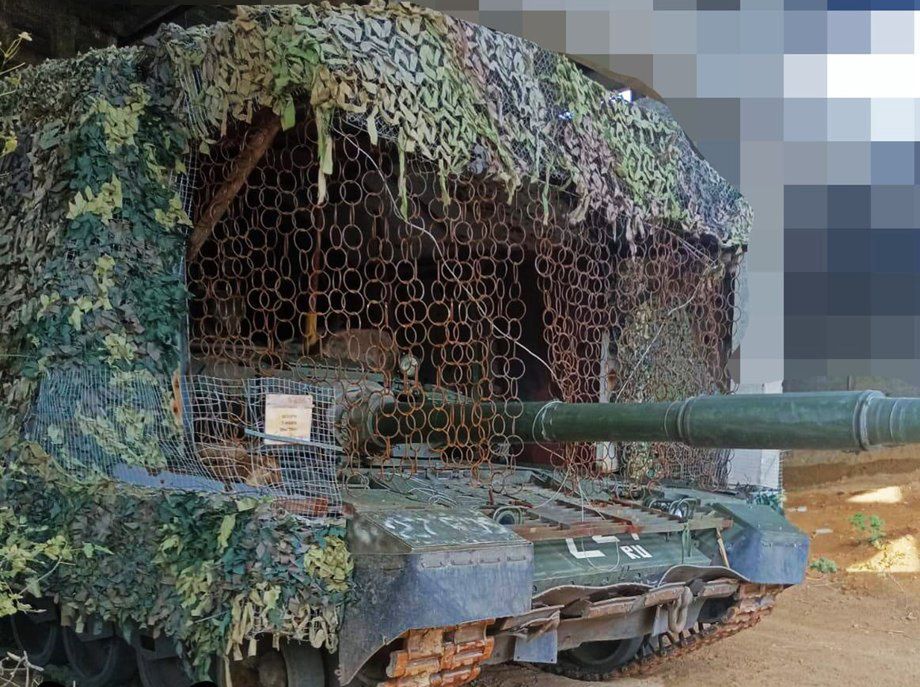Russian ingenuity: T-80BWM tank's 'knight' armour upgrade