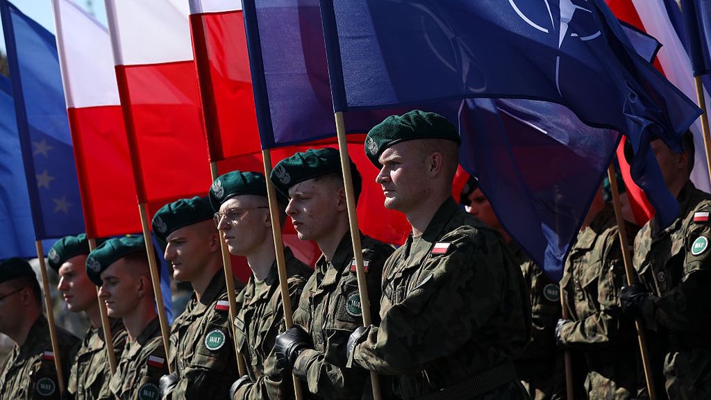 Polish Armed Forces Day Celebrations In Warsaw
In Warsaw, Poland, on August 15, 2025, Polish Army soldiers carry the Polish and NATO flags during a military parade along a highway on the occasion of Polish Armed Forces Day. On August 15, Polish Army Day is celebrated. It is established in memory of the victorious Battle of Warsaw in 1920, fought during the Polish-Bolshevik War. On this occasion, celebrations and picnics with the participation of soldiers are organized throughout the country. A military parade with the participation of the President of the Republic of Poland, Karol Nawrocki, passes through the capital. (Photo by Klaudia Radecka/NurPhoto via Getty Images)
NurPhoto
president of the republic of poland, polish armed forces day, remembrance., polish army, national pride, public event, klaudia radecka, commemorations, august 15, holiday, victory, defense, celebrations, picnics, historical battle, soldiers participation, polish-bolshevik war, battle of warsaw, nurphoto, capital, countrywide, military tradition, military display, commemorative, soldier, soldiers, polish army day