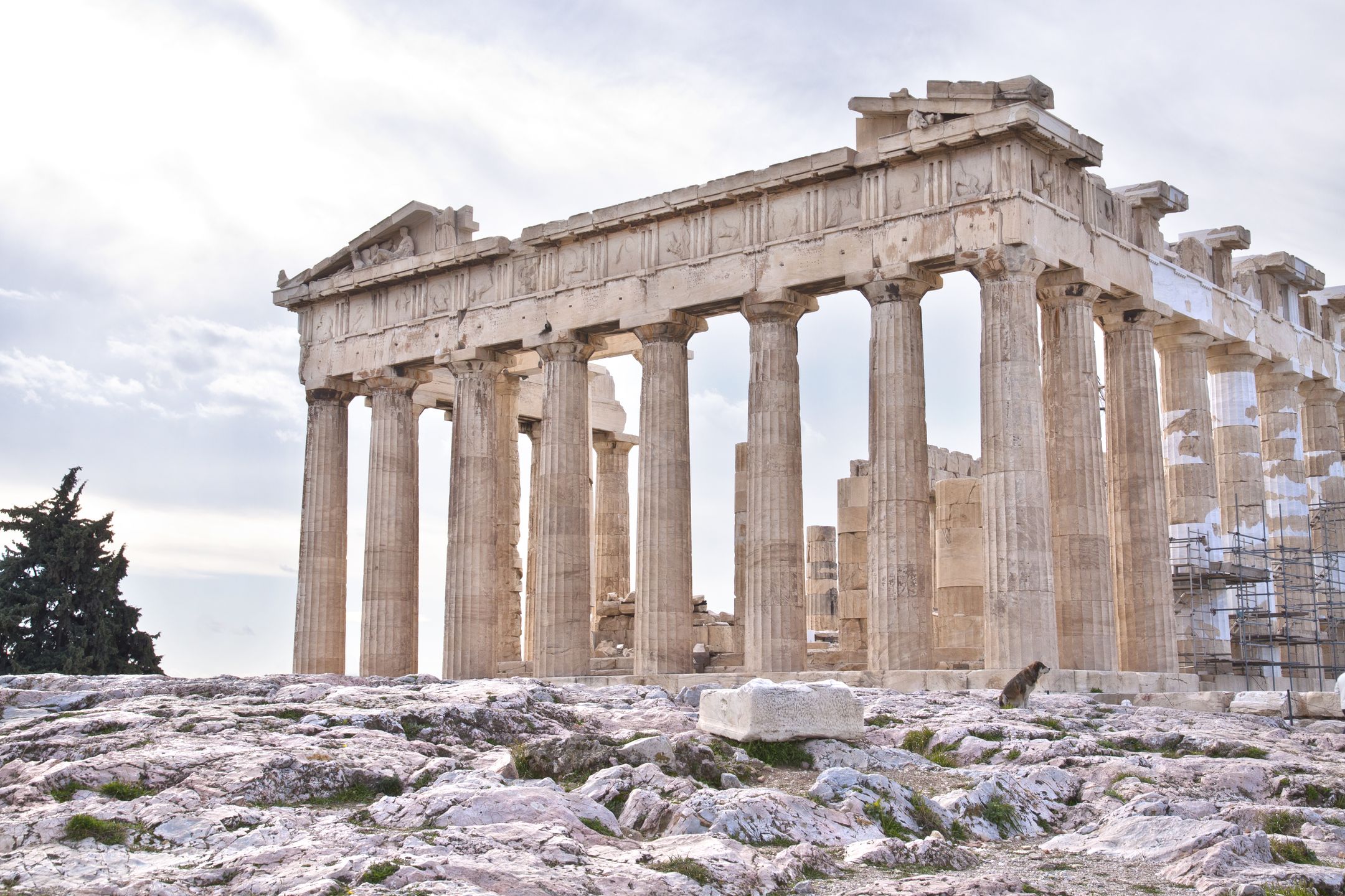 The Parthenon is a former temple on the Athenian Acropolis, Greece, dedicated to the goddess Athena, whom the people of Athens considered their patron. Construction began in 447 BC when the Athenian Empire was at the peak of its power. It was completed in 438 BC although decoration of the building continued until 432 BC 