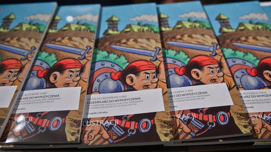 Katalog aukcji komiksu i ilustracji. Oryginalne plansze, tworzone przez wielkich polskich rysowników: Papcia Chmiela, Janusza Christę, Szarlotę Pawrel i Mieczysława Wiśniewskiego