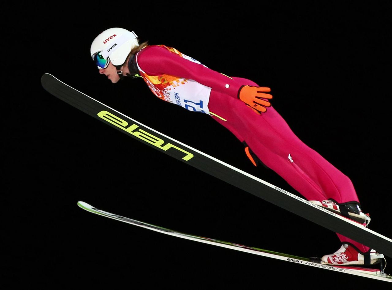 Dawid Kubacki of Poland soars through the air during the Men's Normal Hill Individual Trial Jump in RusSki Gorki Jumping Center at the Sochi 2014 Olympic Games, Krasnaya Polyana, Russia, 09 February 2014. Photo: Daniel Karmann/