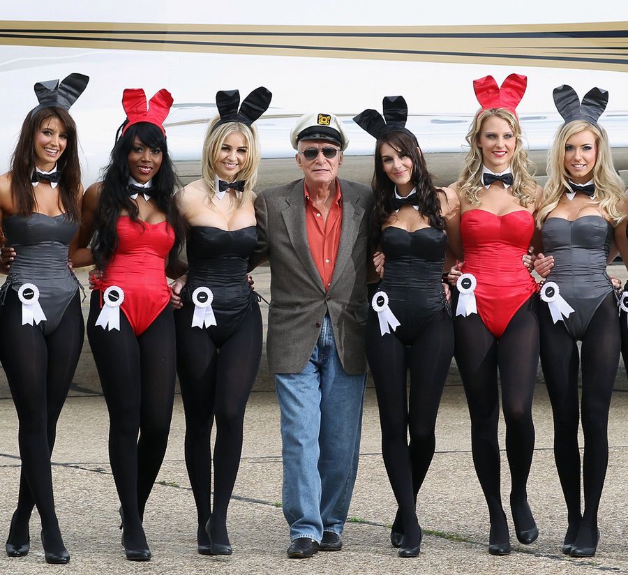 STANSTED, ENGLAND - JUNE 02:  Playboy founder Hugh Hefner arrives at Stansted Airport on June 2, 2011 in Stansted, England. The photograph is a recreation of a picture originally taken in the 1960's. Mr Hefner is back in the UK to mark the launch of the new Playboy Club in Mayfair, which opens on June 4. The clubs opening will welcome back the iconic Playboy Bunny to Londonafter a 30 year absence. Famous Bunnies have included Debbie Harry, Lauren Hutton and Gloria Steinem. (Photo by Dan Kitwood/Getty Images)