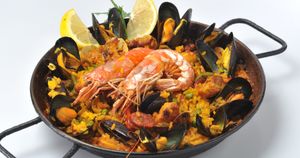 Paella de marisco is one of the best-known Spanish recipes: a single dish based on rice with mussels, squid, prawns, scampi. Spain. (Photo by: Paolo Picciotto/REDA&CO/Universal Images Group via Getty Images)