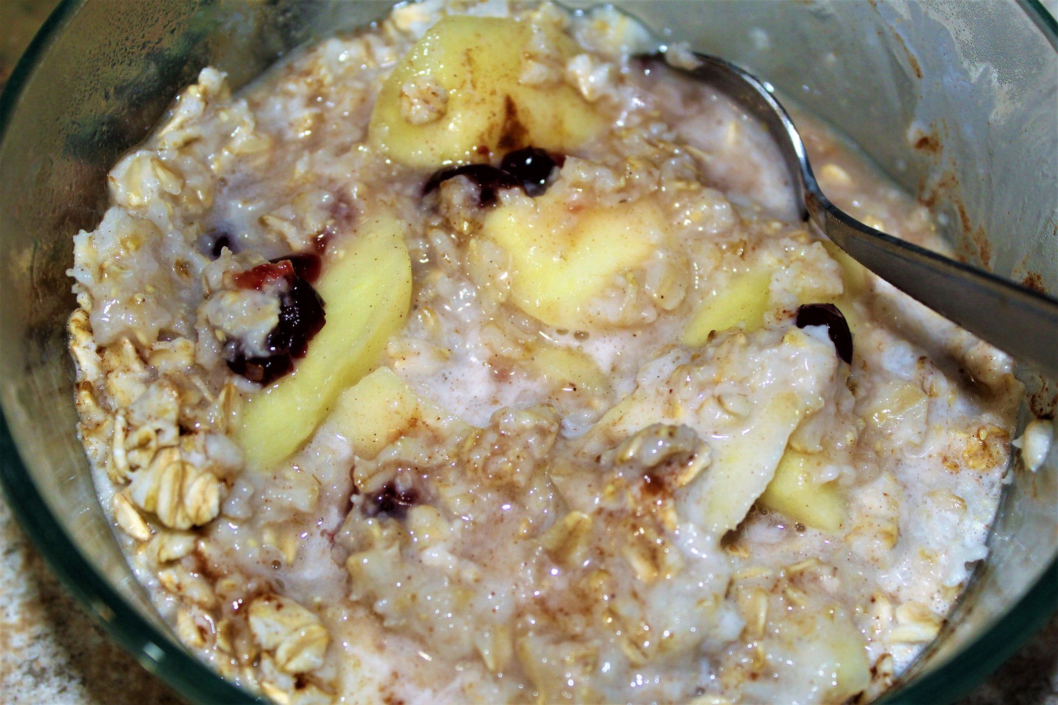 Royalty Free Photograph - Glass Bowl of Morning Oatmeal with Sliced Apples and Cranberries - Best Food Backgrounds for Website, Food Blog, or Marketing - Isolated Close Up My Breakfast Oatmeal - Hot Bowl of Healthy Oatmeal with Apples & Cranberries
Warm up Every Morning with a Delicious Bowl of Heart Healthy Oatmeal - Breakfast Backgrounds - First Person Perspective of My Breakfast - Warm Oatmeal with Sliced Apples and Cranberries - Breakfast Food Art for Website,  Food Blogs, and Marketing - Healthy Oatmeal - Eating Breakfast - Best Food Art
JJPaden
