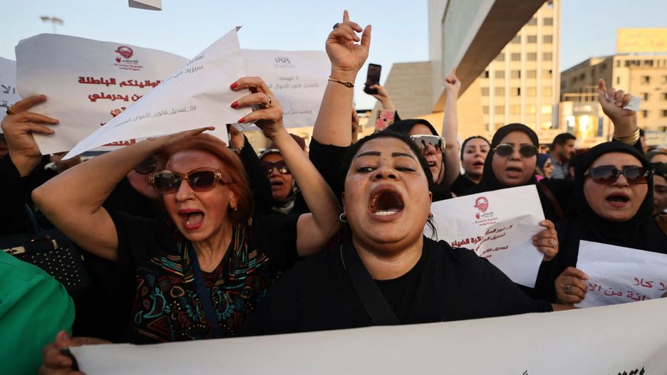 Temporary
Iraqi women demonstrate against underage marriage in Tahrir Square in central Baghdad on August 8, 2024, amid parliamentary discussions over a proposed amendment to the Iraqi Personal Status Law. Rights advocates are alarmed by a bill introduced to Iraq's parliament that, they fear, would roll back women's rights and increase underage marriage in the deeply patriarchal society. (Photo by AHMAD AL-RUBAYE / AFP)
AHMAD AL-RUBAYE