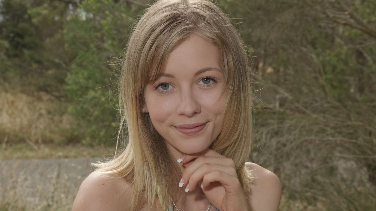 Portrait of pretty womenPortrait of pretty young blond woman with her hand under chin smiling and looking into camera with green trees blurred in backgroundillarionovdvBeautiful, Posing, Portrait, Women, Females, Softness, Adult, Smiling, Sitting, Looking, Beauty, Caucasian Ethnicity, Bench, One Person, Relaxation, Sensuality, Elegance, Green Color, Nature, Lifestyles, Defocused, Outdoors, Chin, Blond Hair, Human Finger, Human Hand, Tree, Light - Natural Phenomenon, Summer, Park - Man Made Space