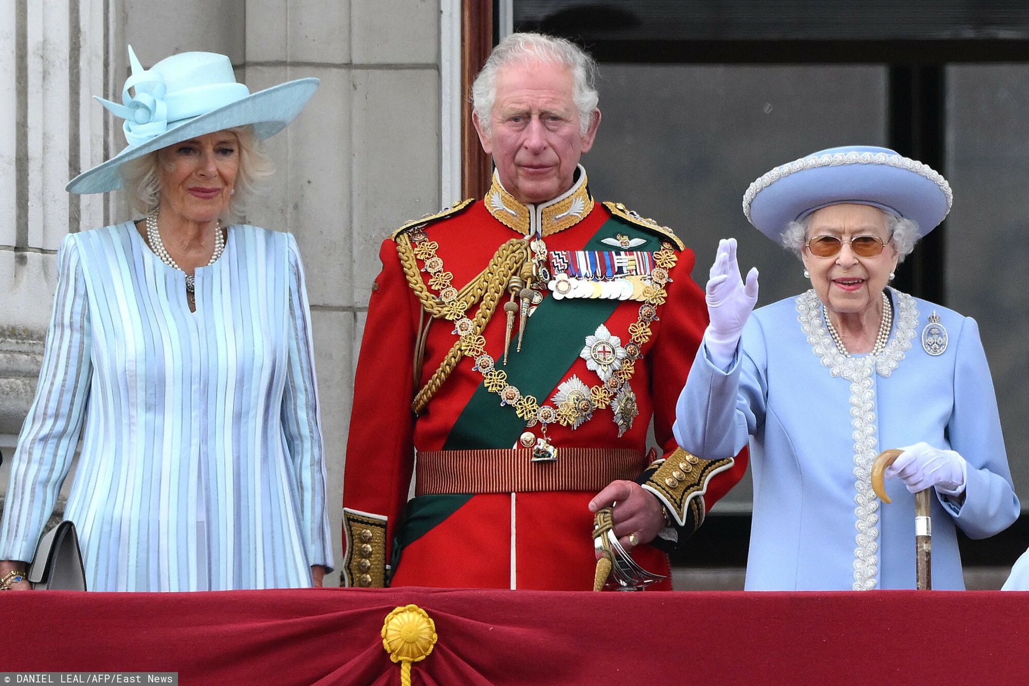 Temporary
(FILES) In this file photo taken on June 2, 2022 Britain's Queen Elizabeth II (R) stands with Britain's Camilla, Duchess of Cornwall (L) and Britain's Prince Charles, Prince of Wales to watch a special flypast from Buckingham Palace balcony following the Queen's Birthday Parade, the Trooping the Colour, as part of Queen Elizabeth II's platinum jubilee celebrations, in London. - Queen Elizabeth II, the longest-serving monarch in British history and an icon instantly recognisable to billions of people around the world, has died aged 96, Buckingham Palace said on September 8, 2022. Her eldest son, Charles, 73, succeeds as king immediately, according to centuries of protocol, beginning a new, less certain chapter for the royal family after the queen's record-breaking 70-year reign. (Photo by Daniel LEAL / AFP)
DANIEL LEAL